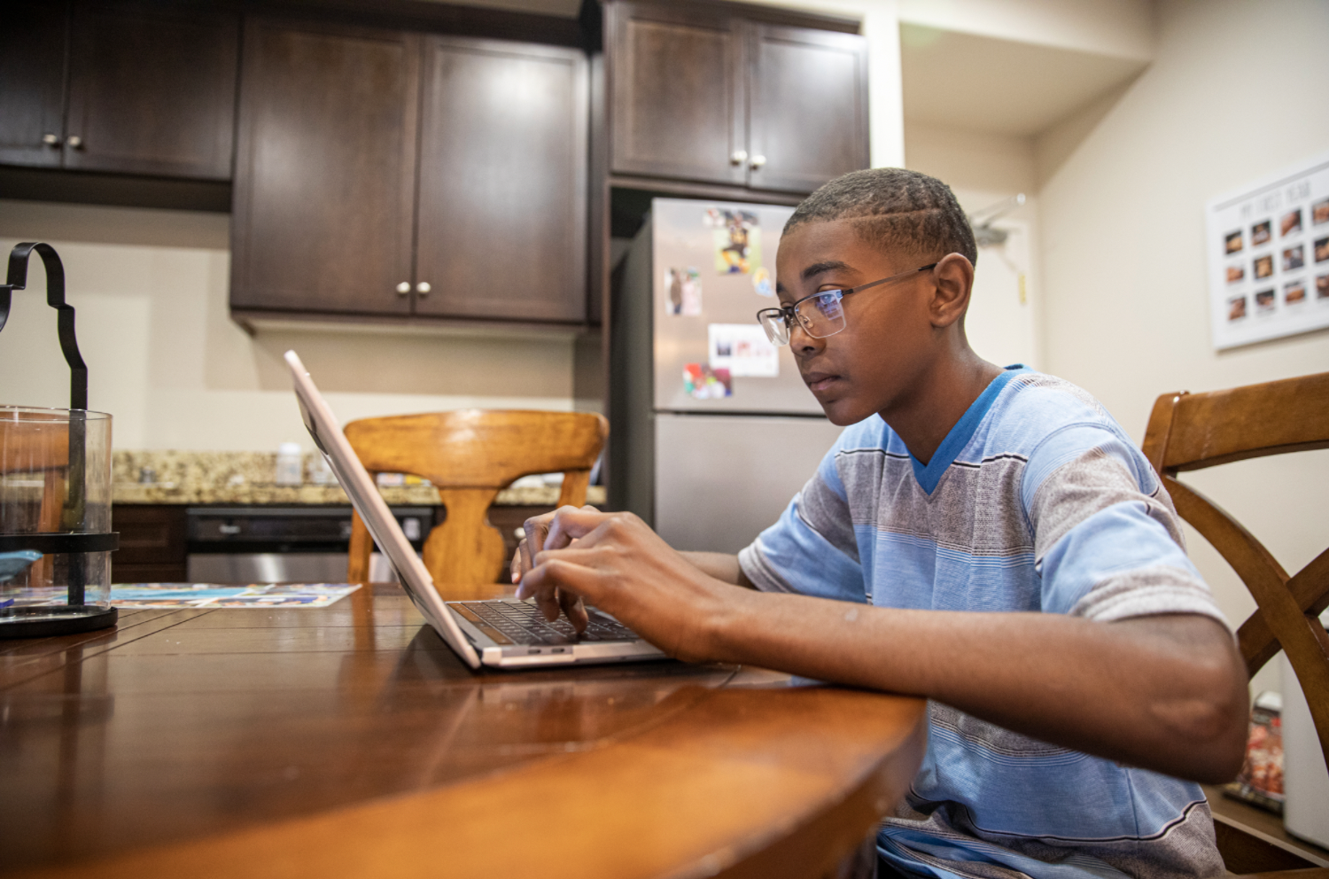 Middle school student with laptop 