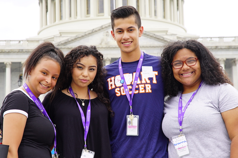 students in front of capital building