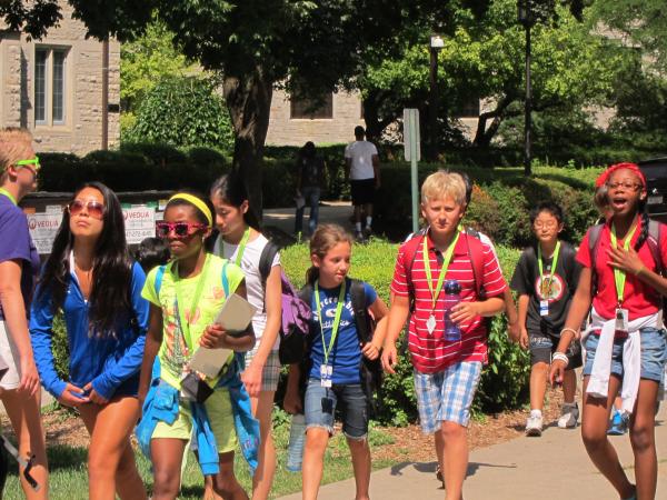 group of middle school students on campus