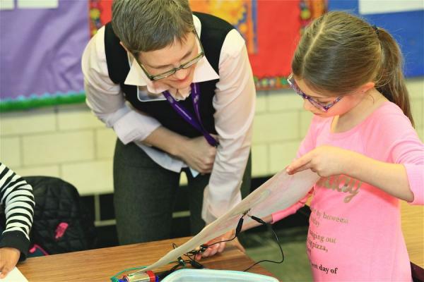 CTD Coordinator with student in class