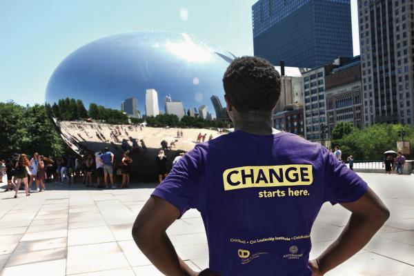 student in front of bean chicago back of shirt