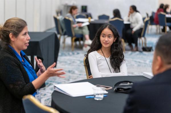 Parent, student and counselor at table