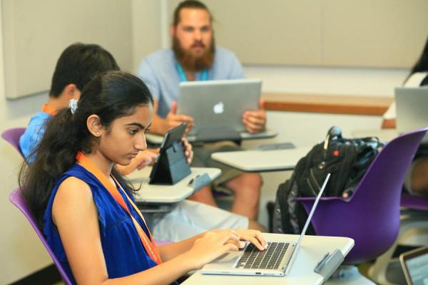 female high school student in summer program classroom